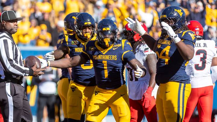 Oct 17, 2026; Morgantown, West Virginia, USA;  West Virginia Mountaineers running back Amari Latimer (1) celebrates after scoring a touchdown during the fourth quarter against the Cincinnati Bearcats at Milan Puskar Stadium.  Mandatory Credit: Ben Queen-Imagn Images