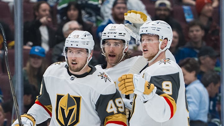 Apr 6, 2025; Vancouver, British Columbia, CAN; Vegas Golden Knights forward Ivan Barbashev (49) and defenseman Noah Hanifin (15) and forward Jack Eichel (9) celebrate Barbashev’s goal against the Vegas Golden Knights in the first period at Rogers Arena. Mandatory Credit: Bob Frid-Imagn Images