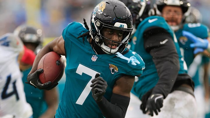 Jacksonville Jaguars wide receiver Brian Thomas Jr. (7) rushes for yards during the second quarter of an NFL football matchup Sunday, Dec. 29, 2024 at EverBank Stadium in Jacksonville, Fla. The Jaguars held off the Titans 20-13. [Corey Perrine/Florida Times-Union]