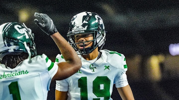 Detroit Cass Tech QB Donald Tabron II celebrates Corey Sadler II’s touchdown in the end zone against Hudsonville, in the second quarter, during the MHSAA Division 1 football finals at Ford Field in Detroit on Saturday, Nov. 30, 2024. Detroit Cass Tech QB Donald Tabron II celebrates Corey Sadler II’s touchdown in the end zone against Hudsonville, in the second quarter, during the MHSAA Division 1 football finals at Ford Field in Detroit on Saturday, Nov. 30, 2024.