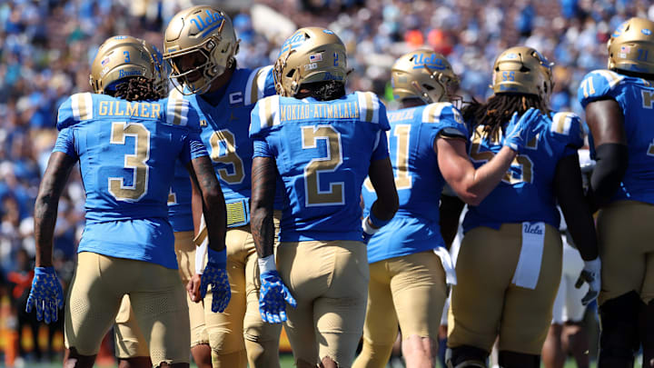 Oct 4, 2025; Pasadena, California, USA; UCLA Bruins wide receiver Kwazi Gilmer (3) celebrates with quarterback Nico Iamaleava (9) after scoring a touchdown during the first quarter against the Penn State Nittany Lions at Rose Bowl. Mandatory Credit: Kiyoshi Mio-Imagn Images Oct 4, 2025; Pasadena, California, USA; UCLA Bruins wide receiver Kwazi Gilmer (3) celebrates with quarterback Nico Iamaleava (9) after scoring a touchdown during the first quarter against the Penn State Nittany Lions at Rose Bowl. Mandatory Credit: Kiyoshi Mio-Imagn Images
