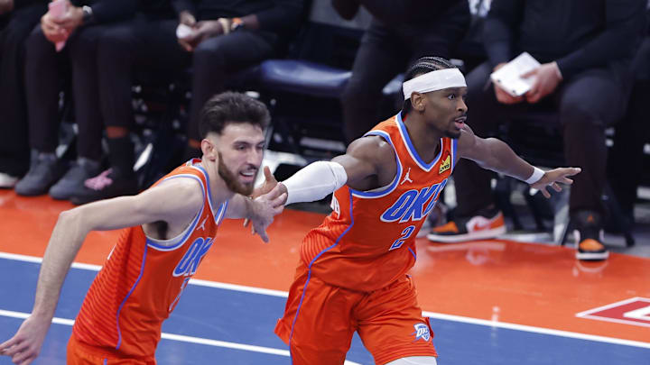 Dec 10, 2025; Oklahoma City, Oklahoma, USA; Oklahoma City Thunder guard Shai Gilgeous-Alexander (2) and center Chet Holmgren (7) celebrate after scoring against the Phoenix Suns during the third quarter at Paycom Center. Mandatory Credit: Alonzo Adams-Imagn Images Dec 10, 2025; Oklahoma City, Oklahoma, USA; Oklahoma City Thunder guard Shai Gilgeous-Alexander (2) and center Chet Holmgren (7) celebrate after scoring against the Phoenix Suns during the third quarter at Paycom Center. Mandatory Credit: Alonzo Adams-Imagn Images
