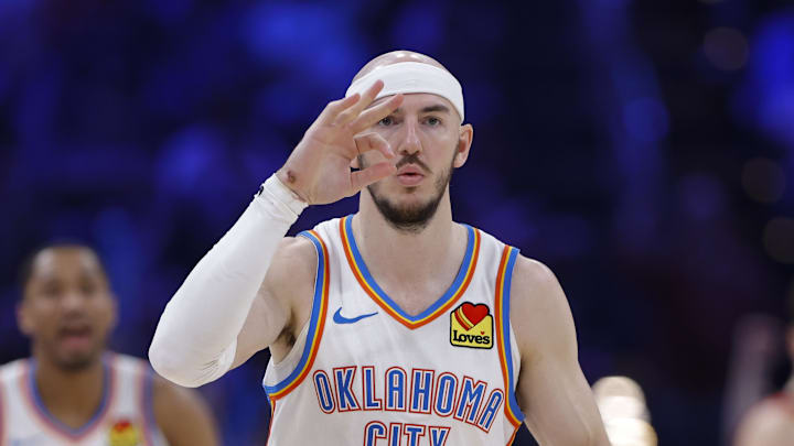 Feb 7, 2026; Oklahoma City, Oklahoma, USA; Oklahoma City Thunder guard Alex Caruso (9) gestures after scoring against the Houston Rockets during the second half at Paycom Center. Mandatory Credit: Alonzo Adams-Imagn Images