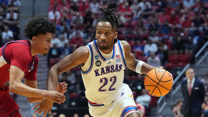 Mar 22, 2026; San Diego, CA, USA; Kansas Jayhawks guard Darryn Peterson (22) controls the ball against St. John's Red Storm guard Oziyah Sellers (4) in the second half during a second round game of the men's 2026 NCAA Tournament at Viejas Arena. Mandatory Credit: Kirby Lee-Imagn Images