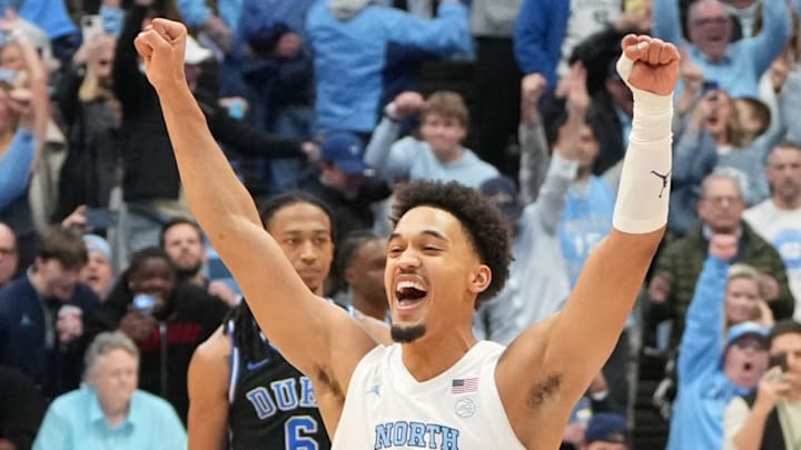 Feb 7, 2026; Chapel Hill, North Carolina, USA; North Carolina Tar Heels guard Seth Trimble (7) celebrates with teammates after the game at Dean E. Smith Center. Mandatory Credit: Bob Donnan-Imagn Images
