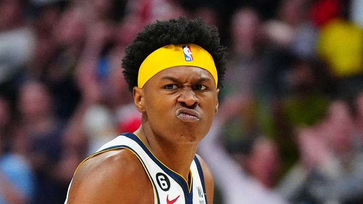 Denver Nuggets forward Peyton Watson (8) reacts to his score in the second half against the Golden State Warriors at Ball Arena on April 2, 2023.