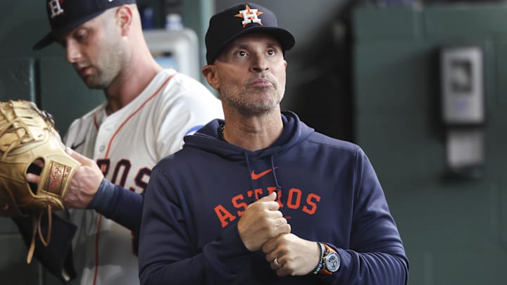 May 24, 2025; Houston, Texas, USA; Houston Astros manager Joe Espada (19) walks in the dugout before the game against the Seattle Mariners at Daikin Park. Mandatory Credit: Troy Taormina-Imagn Images