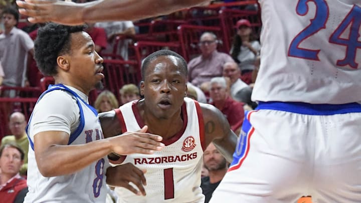 Arkansas Razorbacks guard Johnell Davis drives against the Kansas Jayhawks at Bud Walton Arena in Fayetteville, Ark.