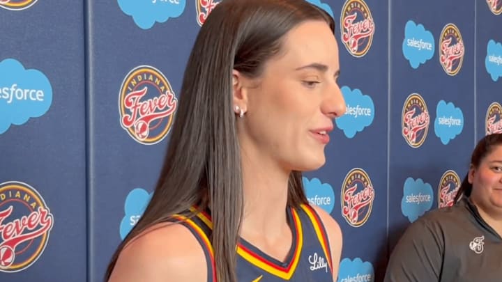 Clark talks to reporters at Fever media day