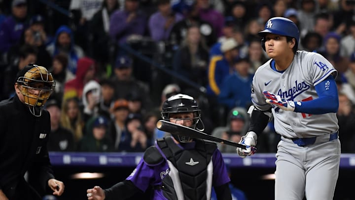 Los Angeles Dodgers designated hitter Shohei Ohtani (17) reacts as he fouls off a pitch during the eighth inning against the Colorado Rockies at Coors Field on April 18, 2026.