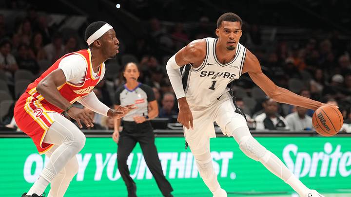 Oct 8, 2026; San Antonio, Texas, USA; San Antonio Spurs forward Victor Wembanyama (1) looks to pass the ball while defended by Atlanta Hawks center Onyeka Okongwu (17) during the first half at Frost Bank Center. Mandatory Credit: Scott Wachter-Imagn Images Oct 8, 2026; San Antonio, Texas, USA; San Antonio Spurs forward Victor Wembanyama (1) looks to pass the ball while defended by Atlanta Hawks center Onyeka Okongwu (17) during the first half at Frost Bank Center. Mandatory Credit: Scott Wachter-Imagn Images