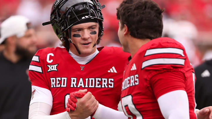 Texas Tech's Behren Morton (left) talks to Jacob Rodriguez prior to a non-conference football game, Saturday, Sept. 13, 2025, at Jones AT&T Stadium.