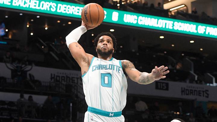 Jan 7, 2025; Charlotte, North Carolina, USA; Charlotte Hornets forward Miles Bridges (0) dunks during the first half again not the Phoenix Suns at the Spectrum Center. Mandatory Credit: Sam Sharpe-Imagn Images Jan 7, 2025; Charlotte, North Carolina, USA; Charlotte Hornets forward Miles Bridges (0) dunks during the first half again not the Phoenix Suns at the Spectrum Center. Mandatory Credit: Sam Sharpe-Imagn Images