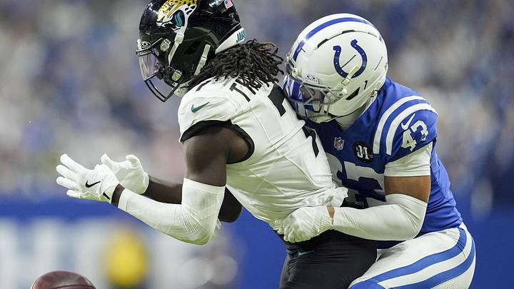 Dec 28, 2025; Indianapolis, Indiana, USA; Indianapolis Colts cornerback Cameron Mitchell (43) breaks up a pass intended for Jacksonville Jaguars wide receiver Brian Thomas Jr. (7) during a game  at Lucas Oil Stadium. 