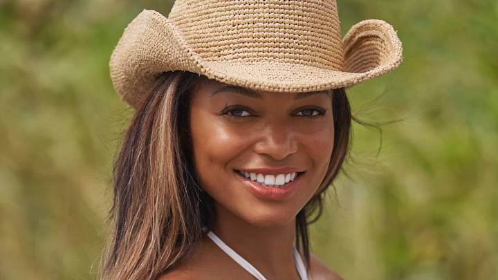 Gabby Thomas was photographed by Ben Horton at The Boca Raton. Swimsuit by Bad N Bare. Hat by Lack Of Color.
