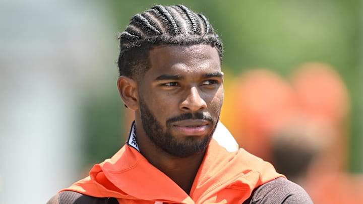 Jun 10, 2025; Berea, OH, USA; Cleveland Browns quarterback Shedeur Sanders (12) walks off the field during minicamp at CrossCountry Mortgage Campus. Mandatory Credit: Ken Blaze-Imagn Images
