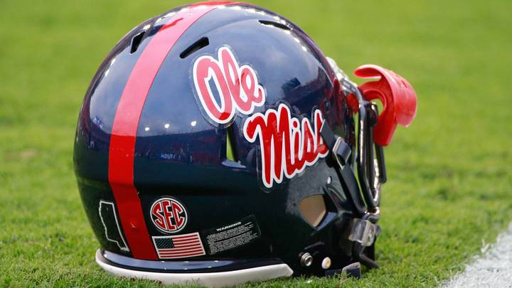 Ole Miss Rebels helmet lays on the field prior to the game at Ben Hill Griffin Stadium.