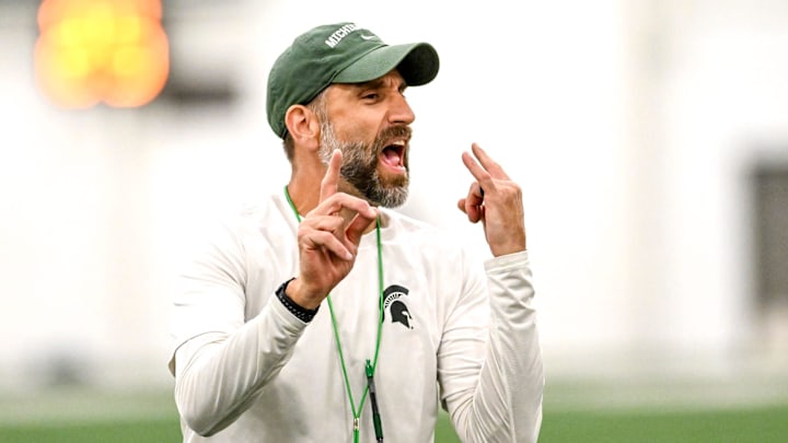 Michigan State's defensive coordinator Joe Rossi gives instructions while working with linebackers during camp on Monday, Aug. 5, 2024, at the indoor practice facility in East Lansing.