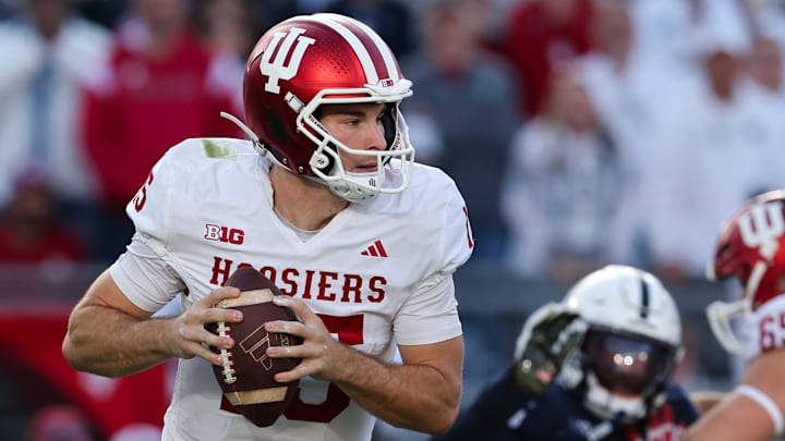 Indiana quarterback Fernando Mendoza moves in the pocket Nov. 8, 2025, against Penn State at Beaver Stadium.