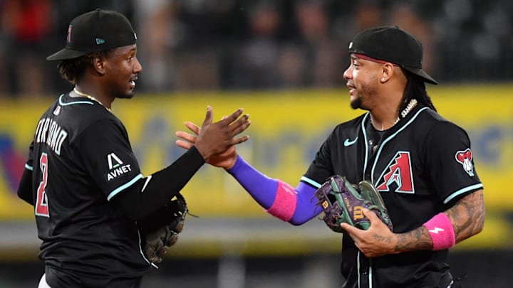 Jun 24, 2025; Chicago, Illinois, USA; Arizona Diamondbacks shortstop Geraldo Perdomo (left) and second baseman Ketel Marte (right) celebrate after defeating the Chicago White Sox at Rate Field. Mandatory Credit: Patrick Gorski-Imagn Images Jun 24, 2025; Chicago, Illinois, USA; Arizona Diamondbacks shortstop Geraldo Perdomo (left) and second baseman Ketel Marte (right) celebrate after defeating the Chicago White Sox at Rate Field. Mandatory Credit: Patrick Gorski-Imagn Images