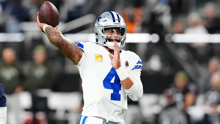 Dallas Cowboys quarterback Dak Prescott warms up prior to a game against the Las Vegas Raiders at Allegiant Stadium.