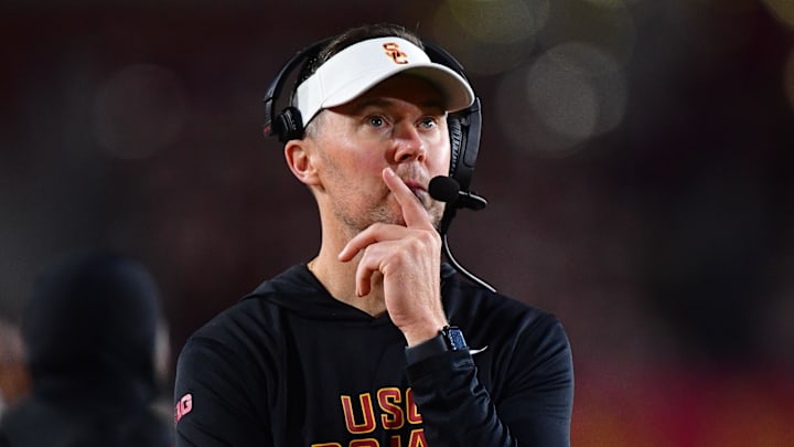Nov 7, 2025; Los Angeles, California, USA; Southern California Trojans head coach Lincoln Riley watches game action against the Northwestern Wildcats during the second half at the Los Angeles Memorial Coliseum. Mandatory Credit: Gary A. Vasquez-Imagn Images