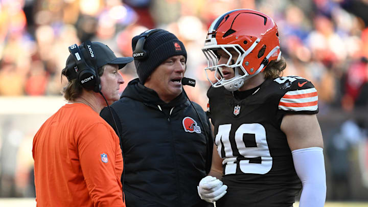 Dec 21, 2025; Cleveland, Ohio, USA;  Cleveland Browns linebacker Carson Schwesinger (49) talks with defensive coordinator Jim Schwartz on the during the second half against the Buffalo Bills at Huntington Bank Field. Mandatory Credit: Ken Blaze-Imagn Images