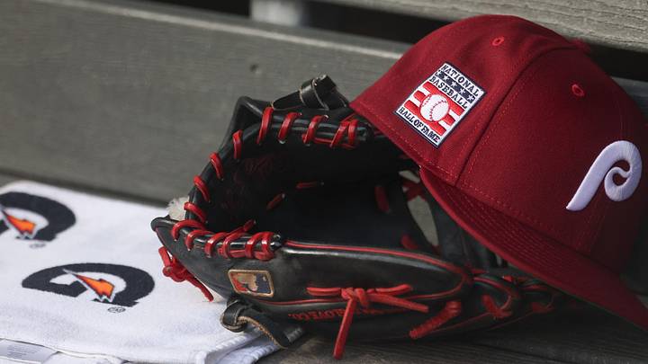 Jul 25, 2025; Bronx, New York, USA; A detailed view of a Hall of Fame patch on a Philadelphia Phillies hat resting in the dugout during the second inning against the New York Yankees at Yankee Stadium. 