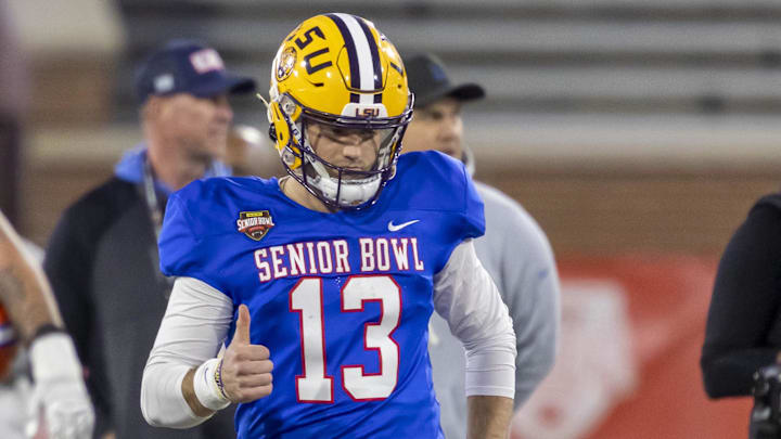 Jan 28, 2026; Mobile, AL, USA; American Team quarterback Garrett Nussmeier (13) of LSU gives a thumbs up during American Senior Bowl practice at Hancock Whitney Stadium. Mandatory Credit: Vasha Hunt-Imagn Images