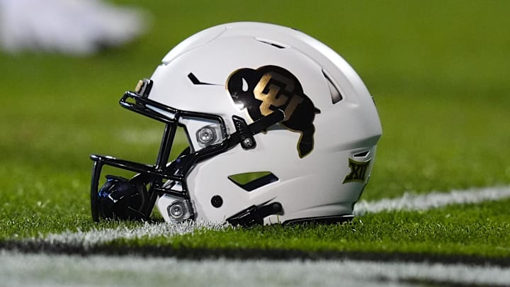 Oct 26, 2024; Boulder, Colorado, USA; General view of a Colorado Buffaloes helmet on the turf of before the game Folsom Field against the Cincinnati Bearcats. Mandatory Credit: Ron Chenoy-Imagn Images