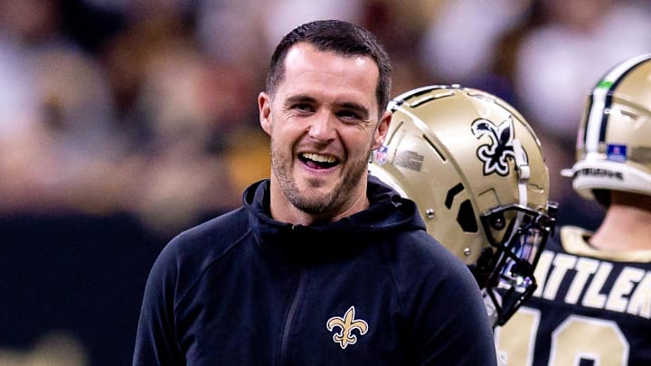 Dec 15, 2024; New Orleans, Louisiana, USA;  New Orleans Saints quarterback Derek Carr (4) after a touchdown against the Washington Commanders during the second half at Caesars Superdome. Mandatory Credit: Stephen Lew-Imagn Images