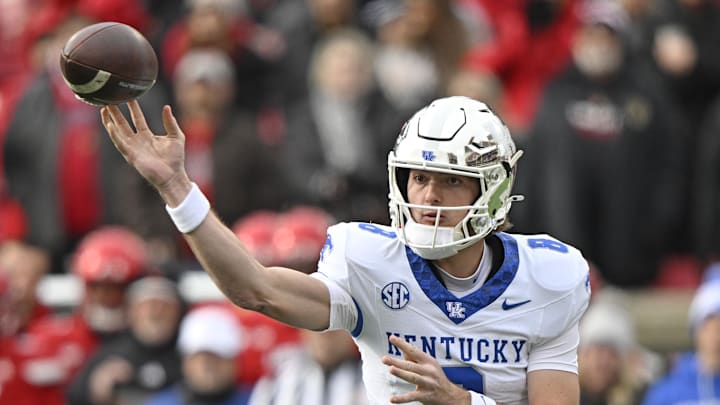 Nov 29, 2025; Louisville, Kentucky, USA;  Kentucky Wildcats quarterback Cutter Boley (8) passes the ball against the Louisville Cardinals during the first quarter at L&N Federal Credit Union Stadium. Mandatory Credit: Jamie Rhodes-Imagn Images
