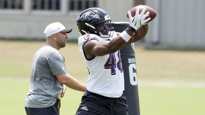 Jun 11, 2025; Baltimore, MD, USA; Baltimore Ravens linebacker Chandler Martin (48) makes a catch during an NFL OTA at Under Armour Performance Center. Mandatory Credit: Daniel Kucin Jr.-Imagn Images