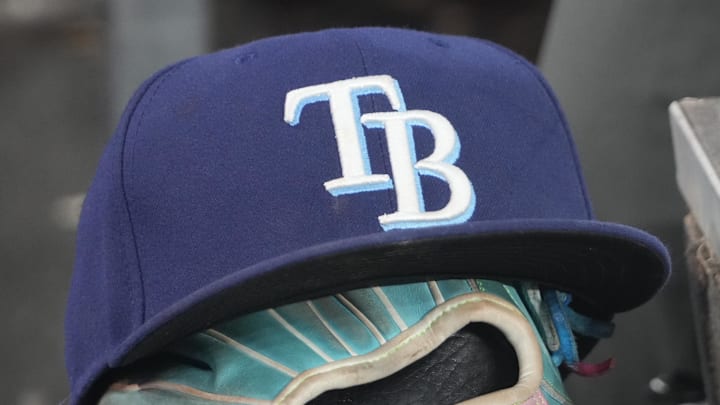 Sep 26, 2025; Toronto, Ontario, CAN; The hat and glove of Tampa Bay Rays third baseman Junior Caminero (13) in the dugout during the game against the Toronto Blue Jays at Rogers Centre. Sep 26, 2025; Toronto, Ontario, CAN; The hat and glove of Tampa Bay Rays third baseman Junior Caminero (13) in the dugout during the game against the Toronto Blue Jays at Rogers Centre.