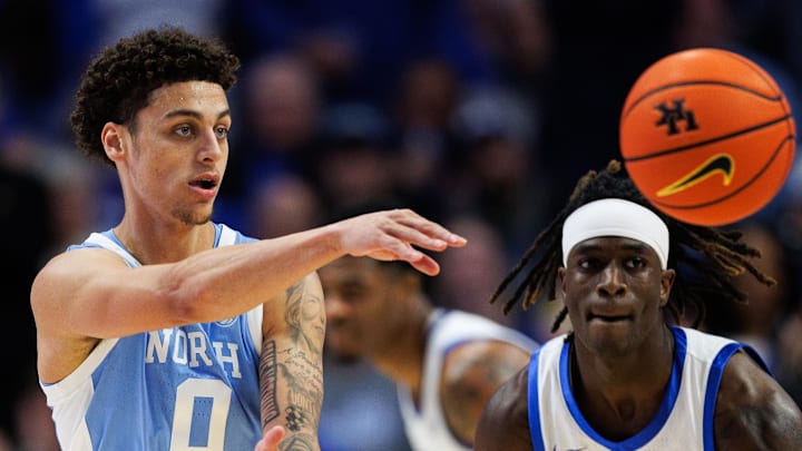 Dec 2, 2025; Lexington, Kentucky, USA; North Carolina Tar Heels guard Kyan Evans (0) passes the ball during the second half against the Kentucky Wildcats at Rupp Arena at Central Bank Center. Mandatory Credit: Jordan Prather-Imagn Images Dec 2, 2025; Lexington, Kentucky, USA; North Carolina Tar Heels guard Kyan Evans (0) passes the ball during the second half against the Kentucky Wildcats at Rupp Arena at Central Bank Center. Mandatory Credit: Jordan Prather-Imagn Images