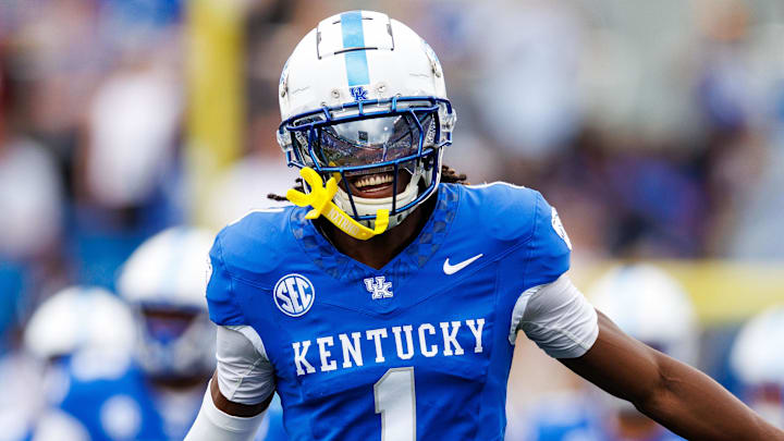 Sep 21, 2024; Lexington, Kentucky, USA; Kentucky Wildcats defensive back Maxwell Hairston (1) runs onto the field before the game against the Ohio Bobcats at Kroger Field. Mandatory Credit: Jordan Prather-Imagn Images