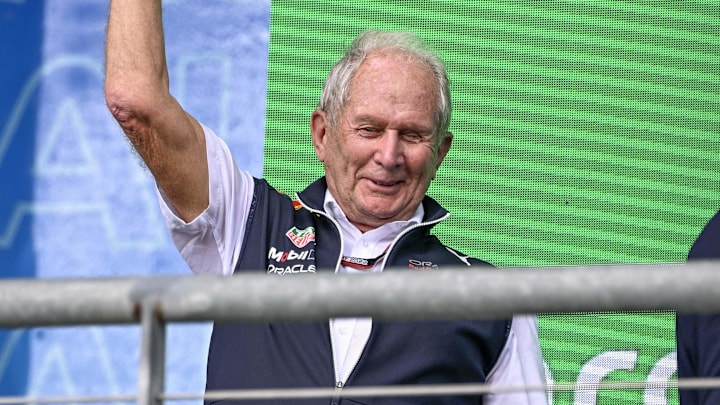 Oct 23, 2022; Austin, Texas, USA; Helmut Marko of Red Bull Racing Team holds up the World Constructors' Champions trophy after the running of the U.S. Grand Prix F1 race at Circuit of the Americas. Mandatory Credit: Jerome Miron-Imagn Images