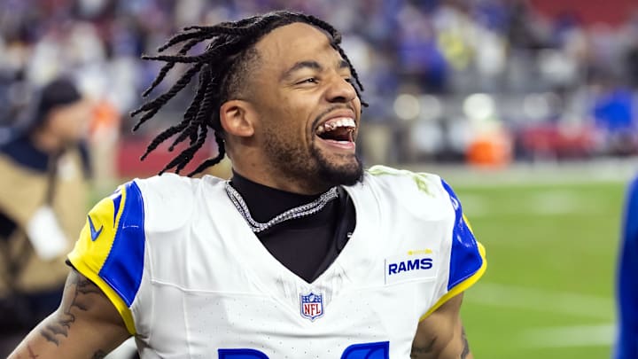 Dec 7, 2025; Glendale, Arizona, USA; Los Angeles Rams cornerback Cobie Durant (14) celebrates after defeating the Arizona Cardinals at State Farm Stadium. Mandatory Credit: Mark J. Rebilas-Imagn Images