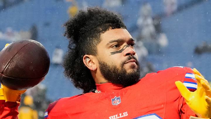 Dec 28, 2025; Orchard Park, New York, USA; Buffalo Bills running back Ty Johnson (26) throws the ball during warmups before the game against the Philadelphia Eagles at Highmark Stadium. Mandatory Credit: Gregory Fisher-Imagn Images Dec 28, 2025; Orchard Park, New York, USA; Buffalo Bills running back Ty Johnson (26) throws the ball during warmups before the game against the Philadelphia Eagles at Highmark Stadium. Mandatory Credit: Gregory Fisher-Imagn Images