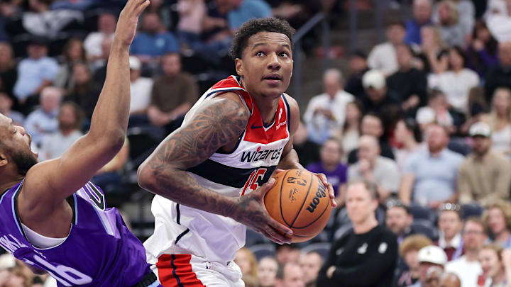 Mar 25, 2026; Salt Lake City, Utah, USA;  Washington Wizards forward Juju Reese (15) drives against Utah Jazz guard Elijah Harkless (16) during the second quarter at Delta Center. Mandatory Credit: Chris Nicoll-Imagn Images