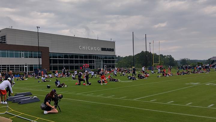 The Bears go through stretching and drills prior to the start of practice at training camp. The Bears go through stretching and drills prior to the start of practice at training camp.