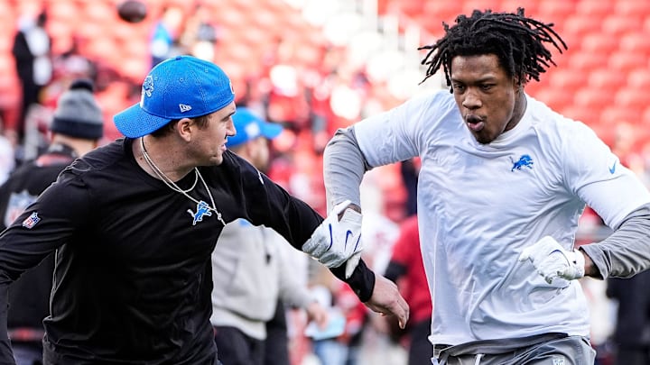 Detroit Lions wide receiver Jameson Williams (9) practice withs assistant wide receivers coach Seth Ryan.