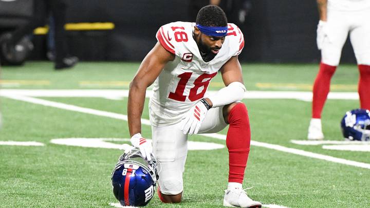 Nov 23, 2025; Detroit, Michigan, USA; New York Giants wide receiver Darius Slayton (18) kneels after the game against the Detroit Lions at Ford Field. Mandatory Credit: Lon Horwedel-Imagn Images Nov 23, 2025; Detroit, Michigan, USA; New York Giants wide receiver Darius Slayton (18) kneels after the game against the Detroit Lions at Ford Field. Mandatory Credit: Lon Horwedel-Imagn Images