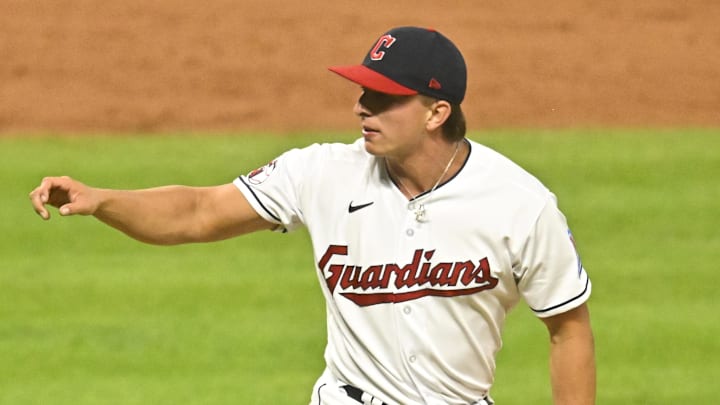 Sep 26, 2023; Cleveland, Ohio, USA; Cleveland Guardians relief pitcher James Karinchak (99) follows through on a pitch in the fifth inning against the Cincinnati Reds at Progressive Field. Mandatory Credit: David Richard-Imagn Images