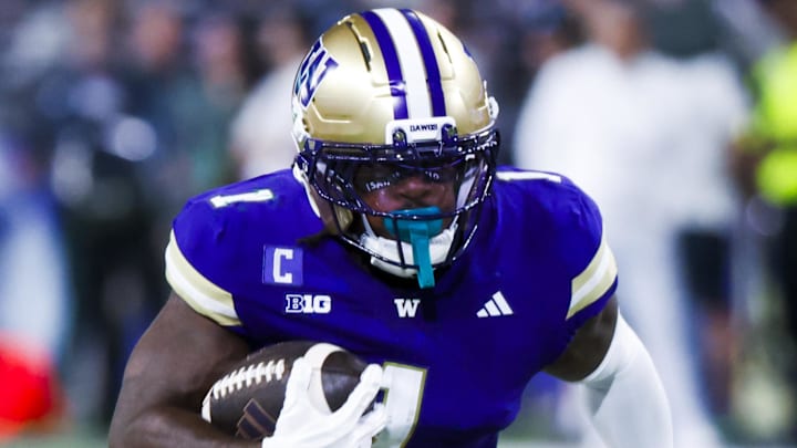 Aug 30, 2025; Seattle, Washington, USA; Washington Huskies running back Jonah Coleman (1) rushes for a touchdown against the Colorado State Rams during the first quarter at Husky Stadium. Mandatory Credit: Joe Nicholson-Imagn Images