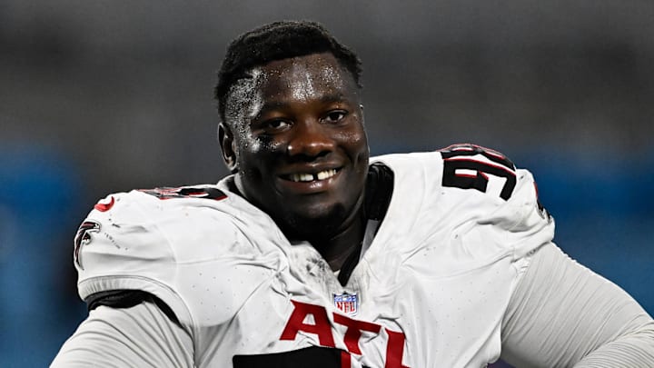 Oct 13, 2024; Charlotte, North Carolina, USA; Atlanta Falcons defensive tackle Ruke Orhorhoro (98) walks off the field after the game at Bank of America Stadium. Mandatory Credit: Bob Donnan-Imagn Images