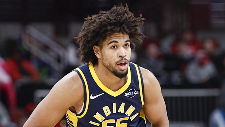 Indiana Pacers guard Ethan Thompson (55) looks to pass the ball against the Chicago Bulls during the first half at United Center.