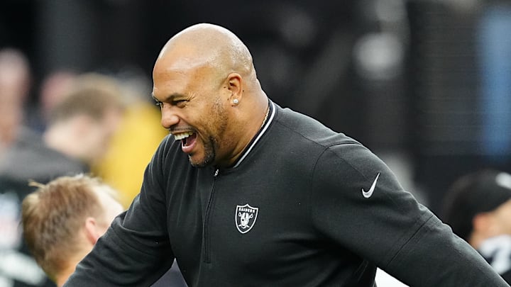 Nov 24, 2024; Paradise, Nevada, USA; Las Vegas Raiders head coach Antonio Pierce greets a player before the start of a game against the Denver Broncos at Allegiant Stadium. Mandatory Credit: Stephen R. Sylvanie-Imagn Images