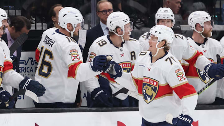 Jan 8, 2025; Salt Lake City, Utah, USA; Florida Panthers center Jesper Boqvist (70) celebrates with teammates an open net goal against the Utah Hockey Club during the third period at Delta Center. Mandatory Credit: Rob Gray-Imagn Images