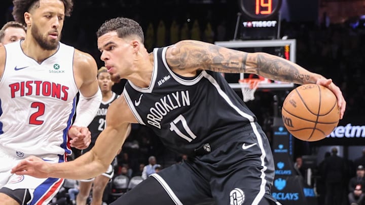 Mar 10, 2026; Brooklyn, New York, USA;  Brooklyn Nets forward Michael Porter Jr. (17) looks to drive past Detroit Pistons guard Cade Cunningham (2) in the first quarter at Barclays Center. Mandatory Credit: Wendell Cruz-Imagn Images